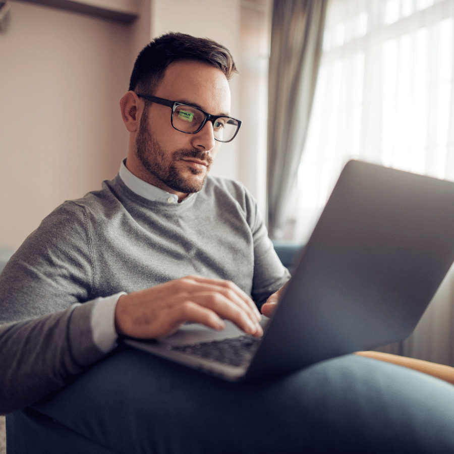 Entreprenueur,-Man-on-Computer---AdobeStock_203009412