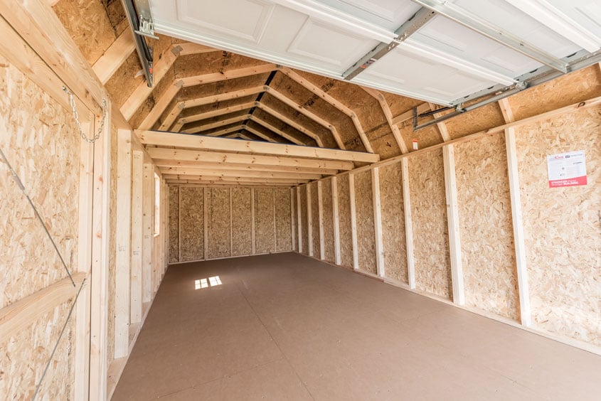 Inside a Lofted Garage with the Door Up 